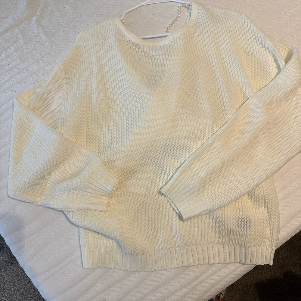 Cream shirt with pearls in the back